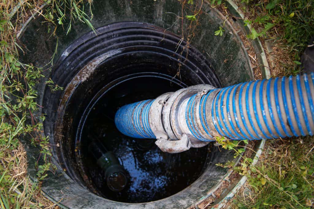 A pipe inside a septic tank to empty it