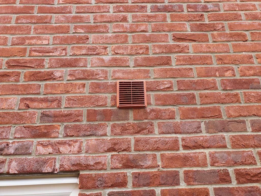 The outside vent showing the houses ventilation ductwork