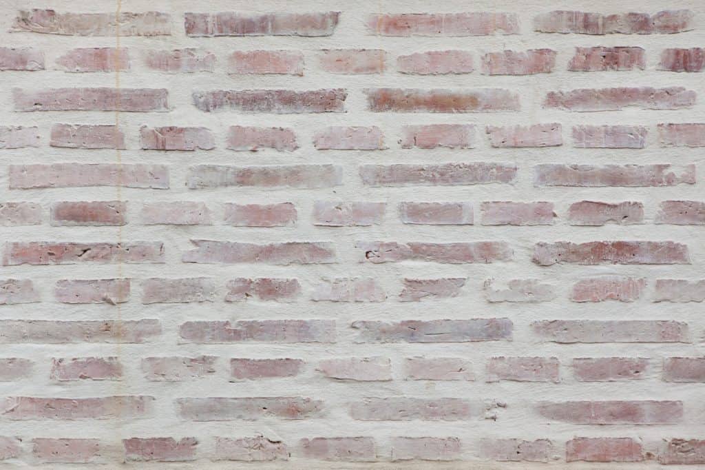A whitewashed brick wall